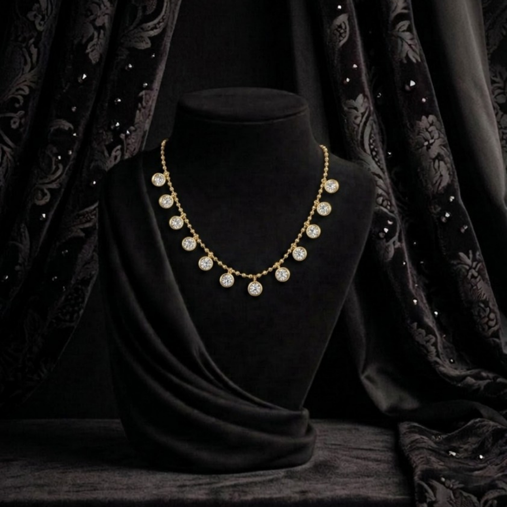 Elegance Redefined:  Gold Plated Bezel-Set Zirconia Shimmer Dangle Necklace