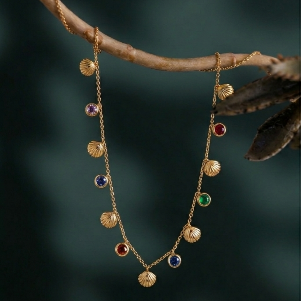 Luxury Gold Seashell Charm Necklace with Multicolor Gemstones – Elegant Beach-Inspired Statement Jewelry