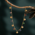 Luxury Gold Seashell Charm Necklace with Multicolor Gemstones – Elegant Beach-Inspired Statement Jewelry